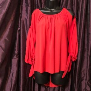 Cold shoulder top melon colored with hi low hem